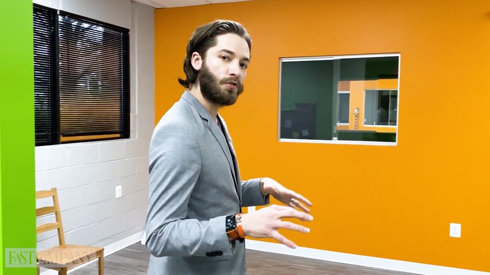 Brian Larsen speaking on camera during a Fast Company video segment
